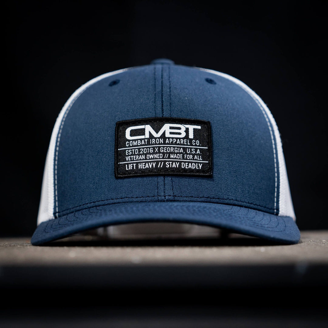 CMBT standard black woven patch mid-profile mesh snapback hat in black with a black and white patch on the front #color_navy-white