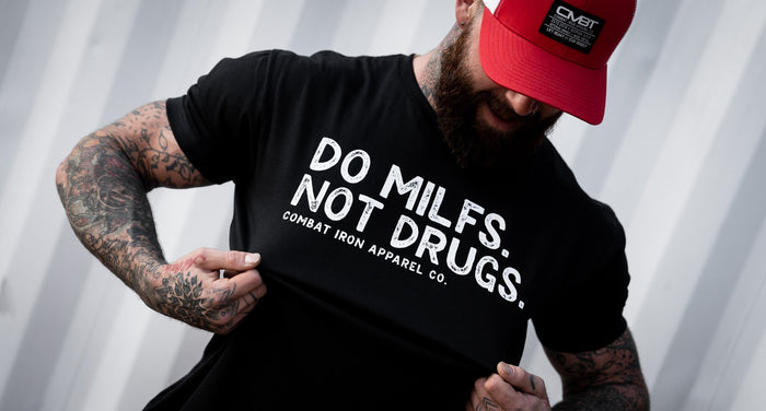 A man in a funny Do Milfs. Not Drugs. T-shirt