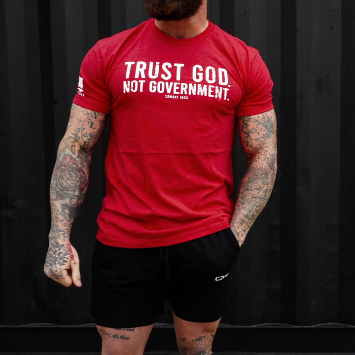 Men’s black t-shirt with the message “Trust God. Not government.” with letters and a American flag on the sleeve #color_red