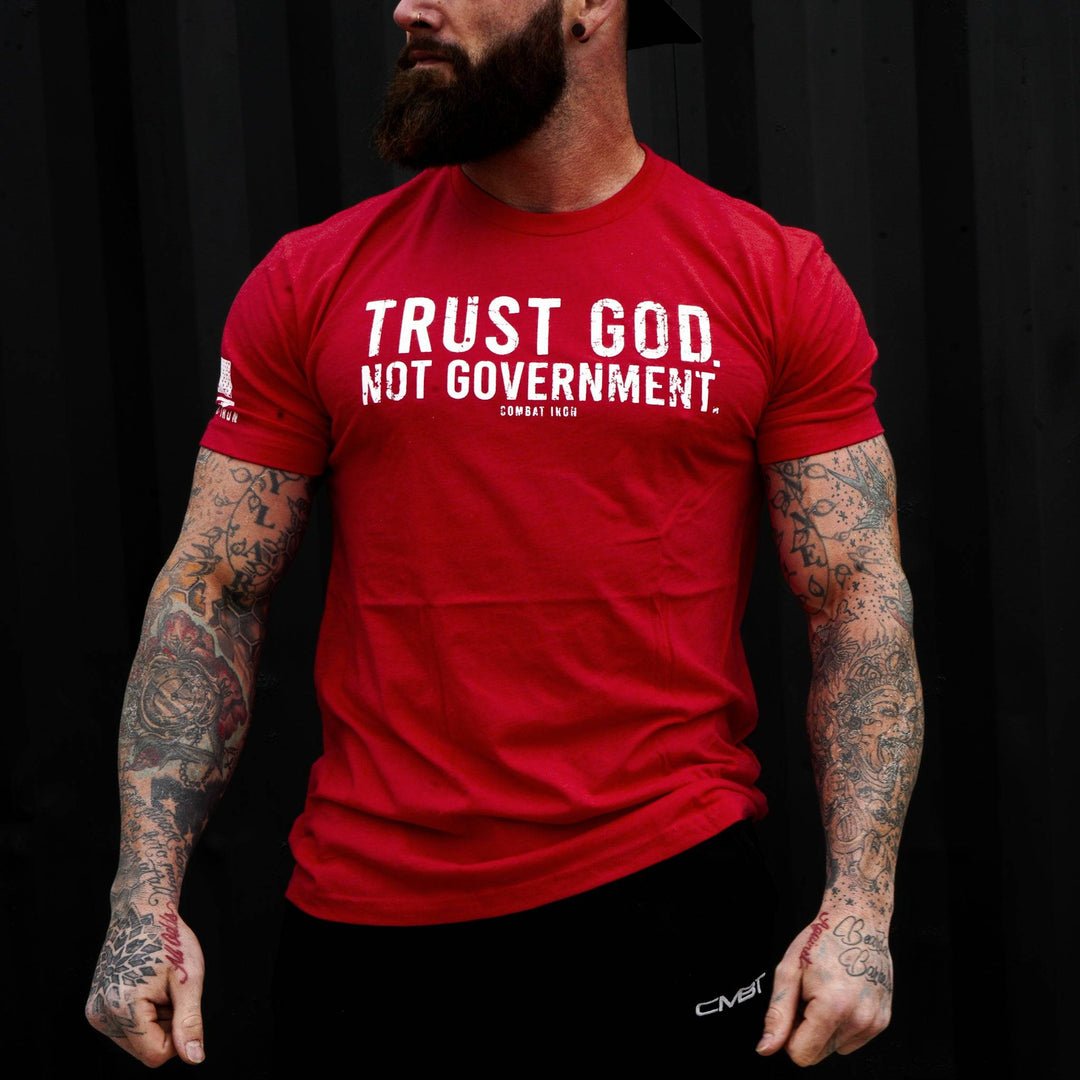 Men’s black t-shirt with the message “Trust God. Not government.” with letters and a American flag on the sleeve #color_red