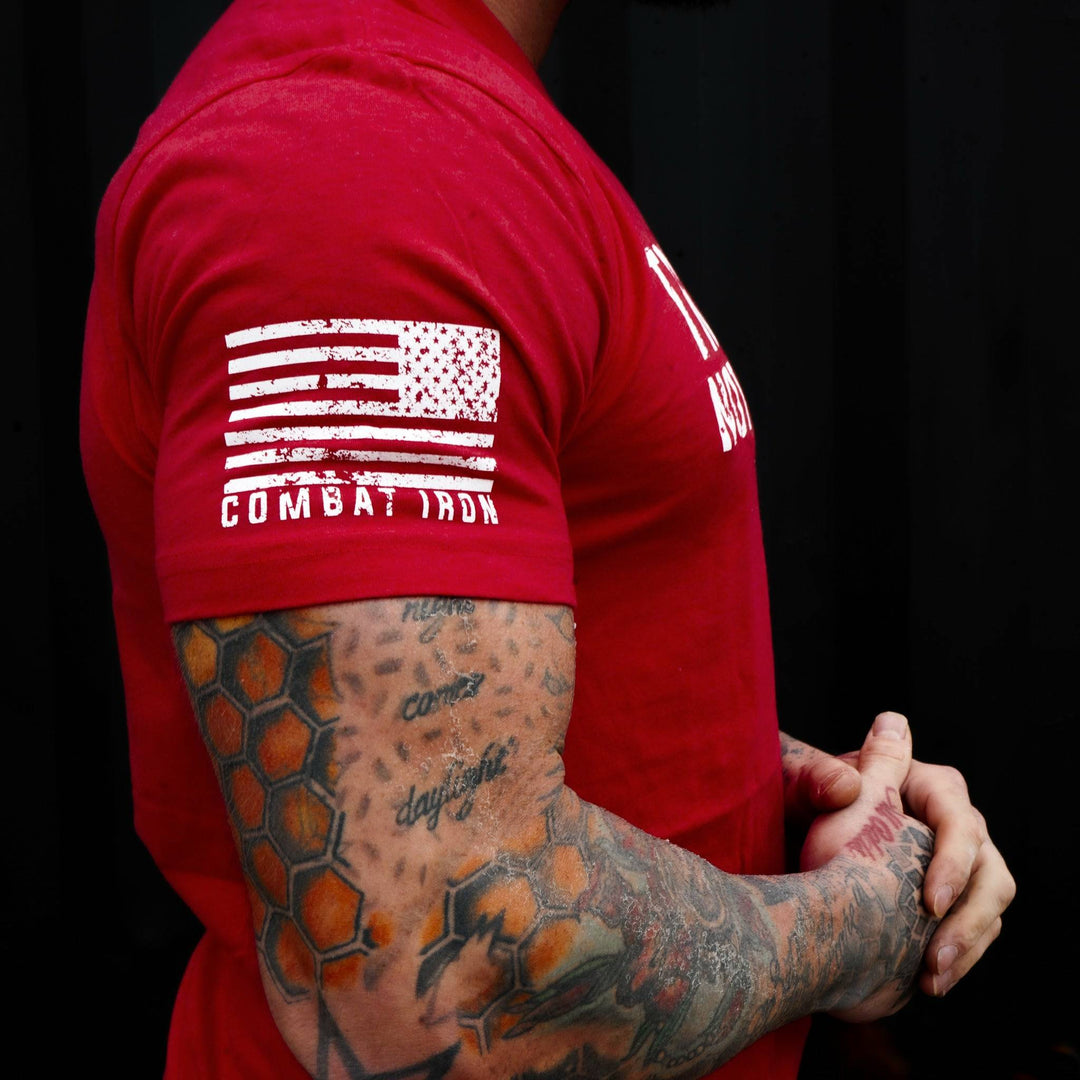 Men’s black t-shirt with the message “Trust God. Not government.” with letters and a American flag on the sleeve #color_red