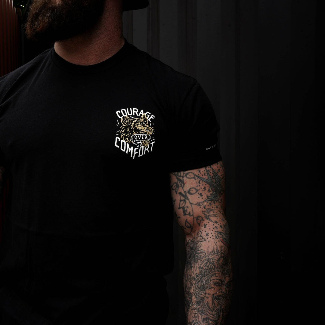 Courage over comfort - wolf edition, men’s t-shirt in black with yellow details #color_black