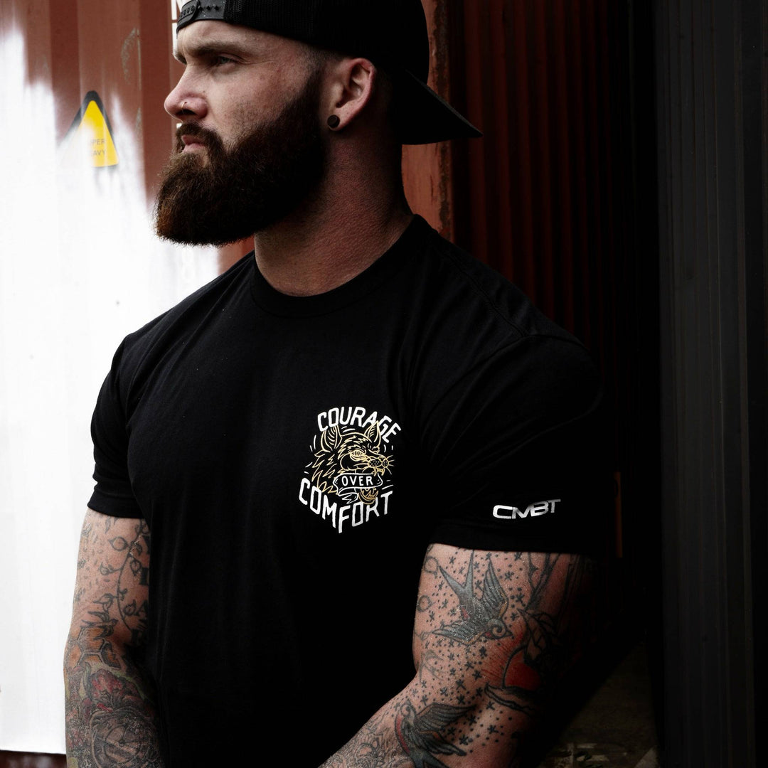 Courage over comfort - wolf edition, men’s t-shirt in black with yellow details #color_black