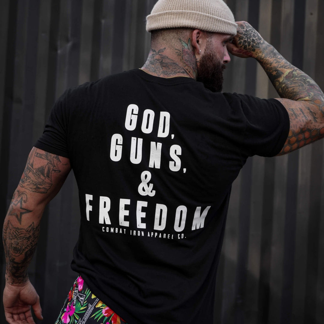 Men’s black t-shirt with the words “God, guns, & freedom” in white on the front #color_black