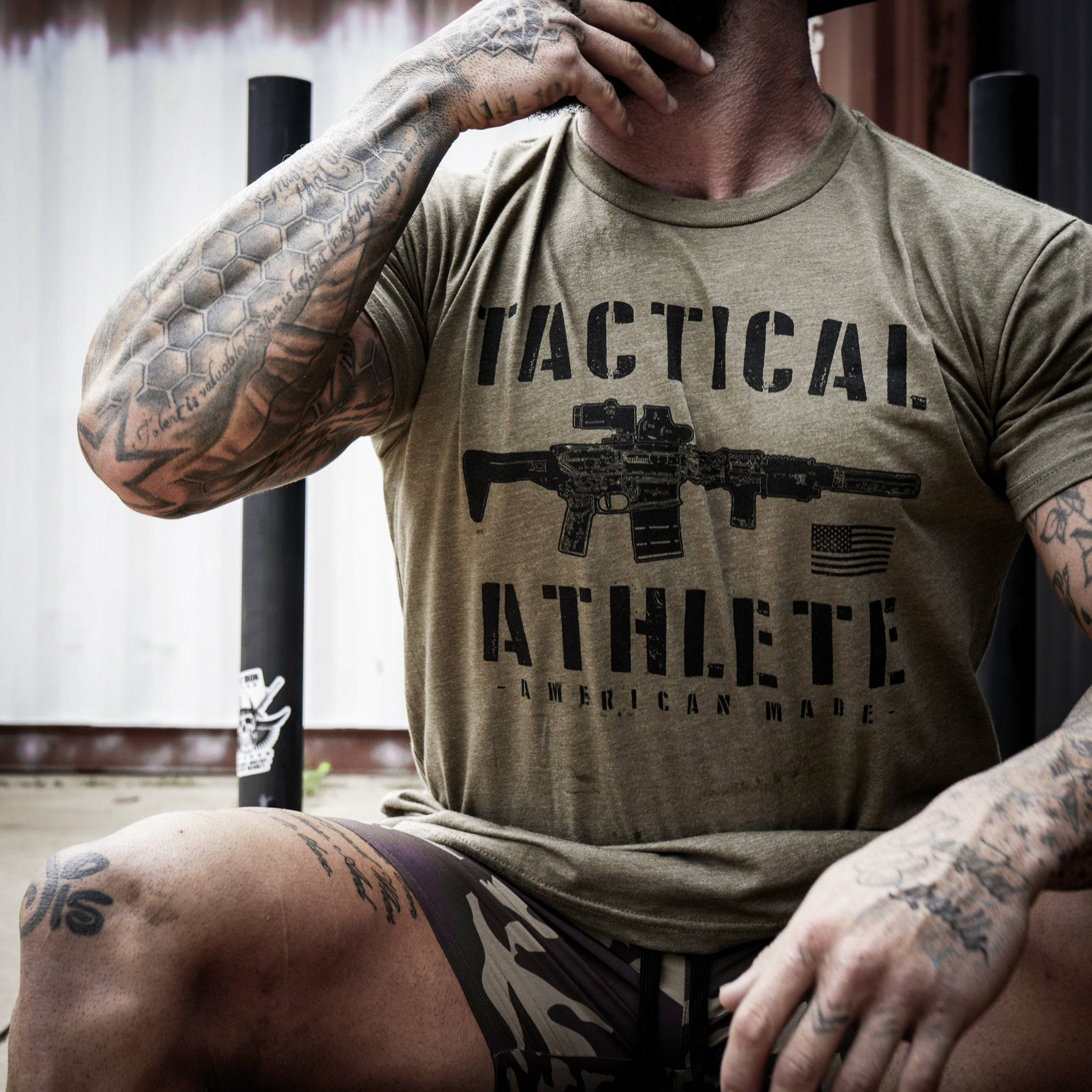 Tactical athlete American-made, men’s t-shirt in olive green with black letters and design #color_military-green 