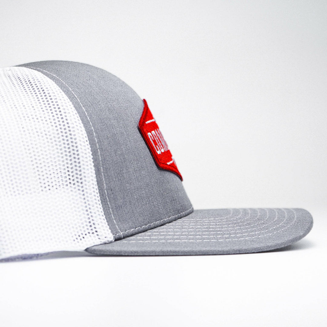 Combat branded patch mid-profile mesh snapback with a black and white patch on the front #color_gray-white