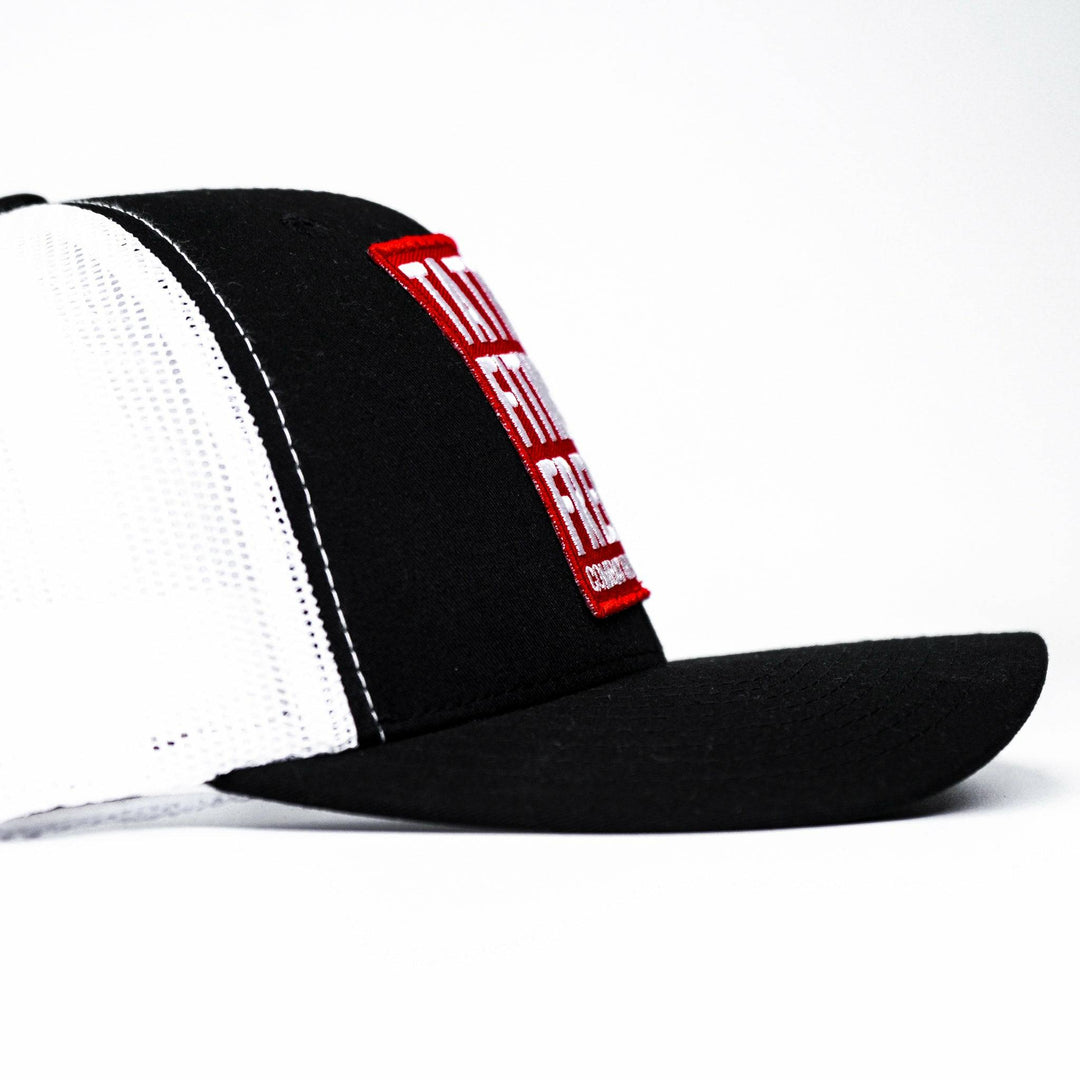 A black mid-profile mesh snapback with a red patch saying “Tattoos, fitness & freedom” in white letters #color_black-white