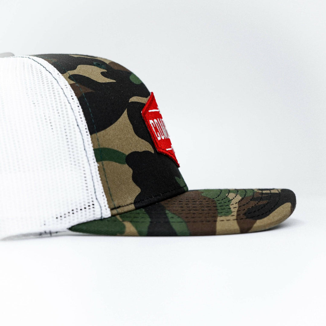 Combat branded patch mid-profile mesh snapback with a black and white patch on the front #color_bdu-camo-white