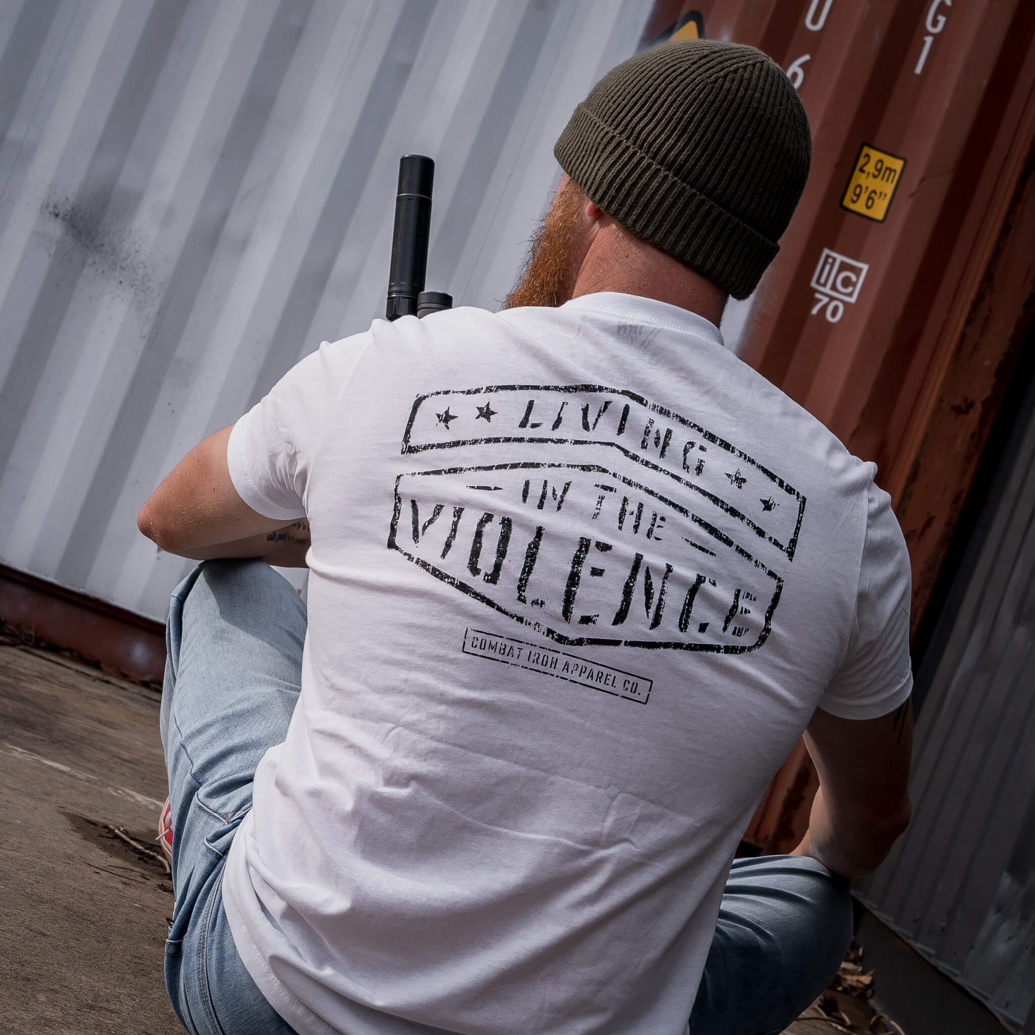 Men’s t-shirt with the words “Living in the violence” #color_white