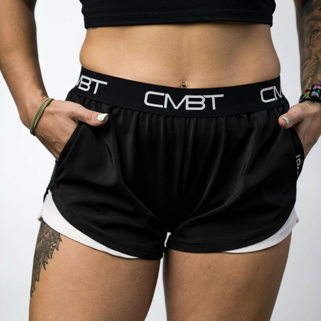 CMBT cross-training ladies’ shorts, all black with the CMBT logo in white #color_black