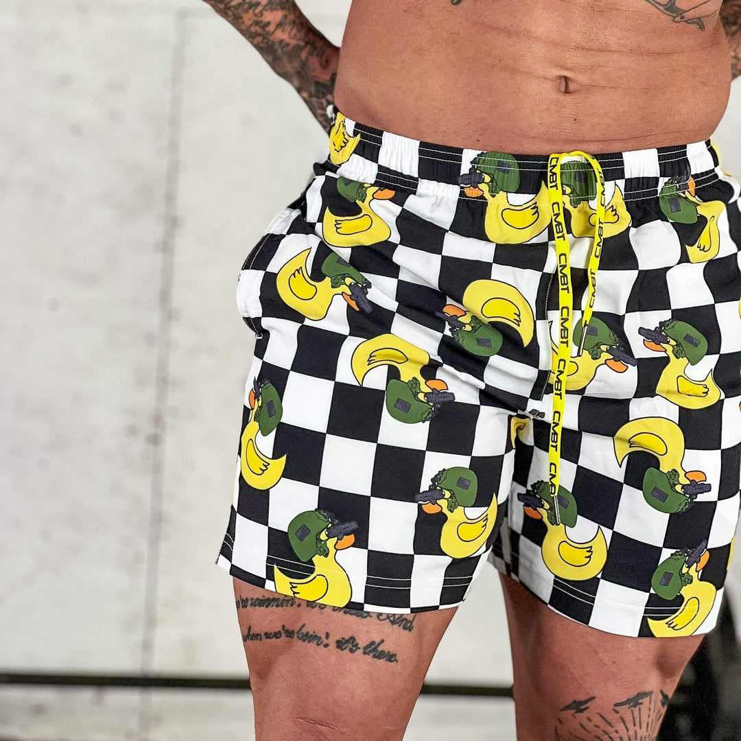Men’s performance training shorts with black and white checkered design and ducks #color_tactiduck-checkered-edition