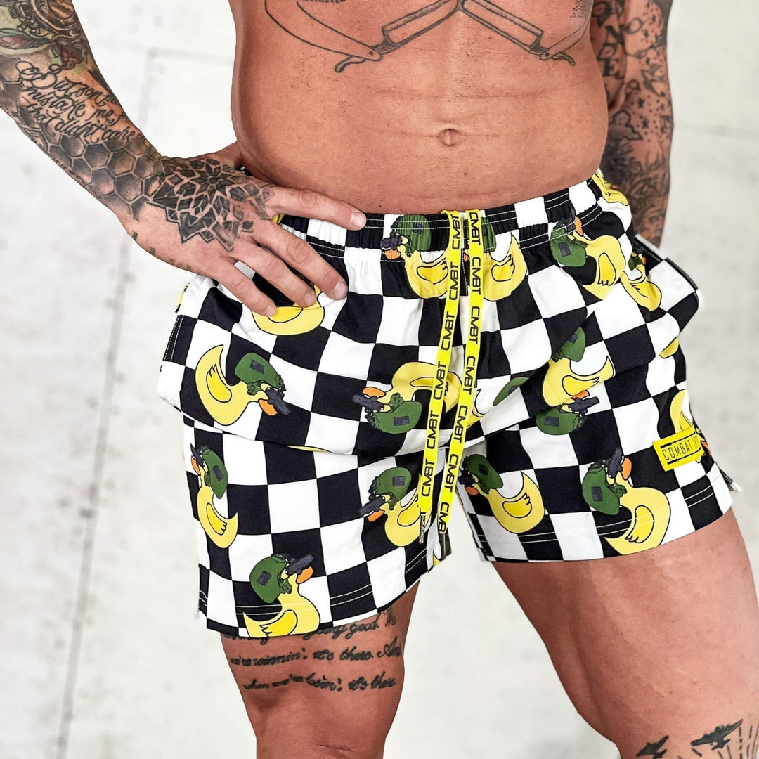 Men’s performance training shorts with black and white checkered design and ducks #color_tactiduck-checkered-edition