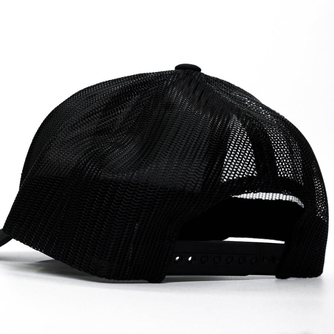 A black mid-profile mesh snapback with the words “Trust God. Not government.” in white on the front #color_black-black
