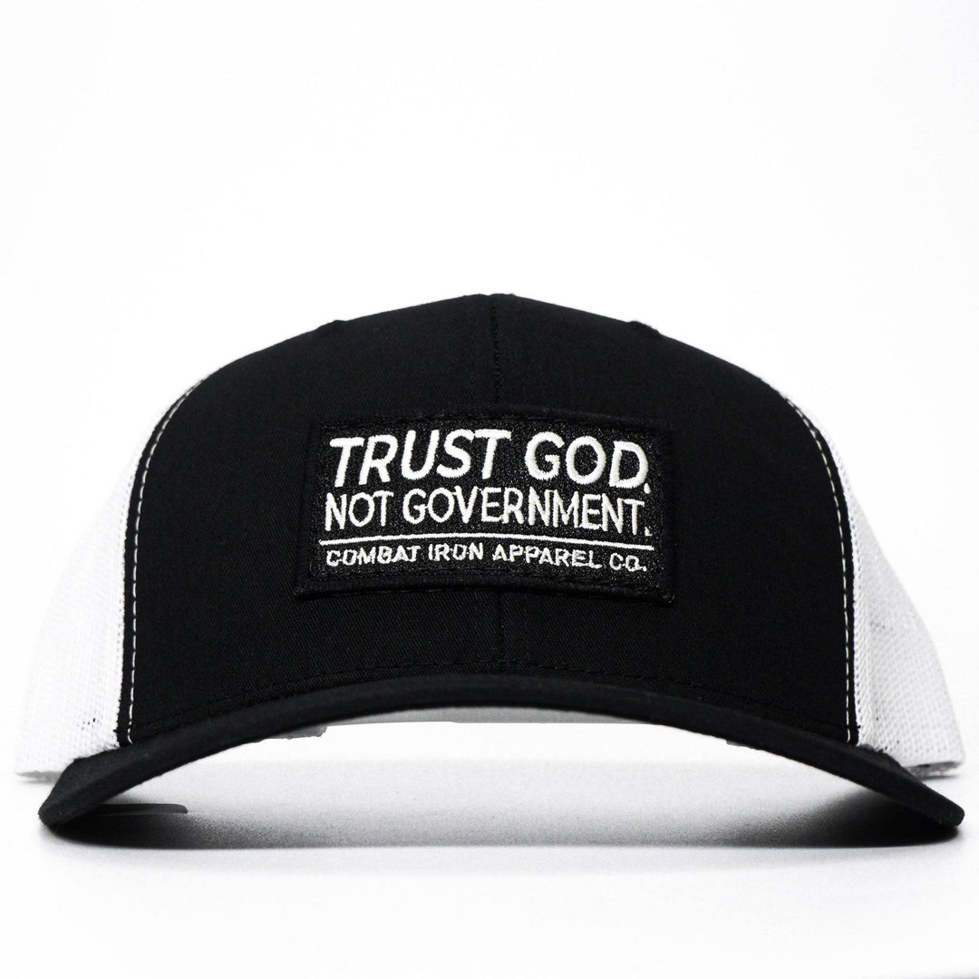 A black mid-profile mesh snapback with the words “Trust God. Not government.” in white on the front #color_black-white
