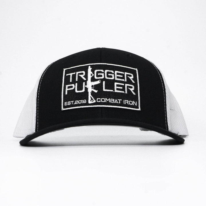 A mid-profile mesh snapback with the words “Trigger puller” on the front in white #color_black-white