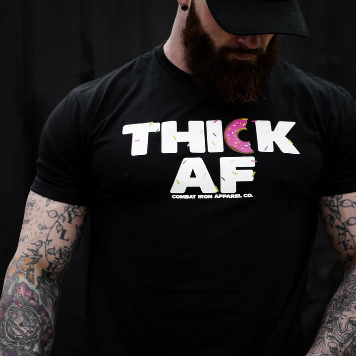 Thick AF donut edition, men’s t-shirt in all black with white and pink design #color_black#color_black