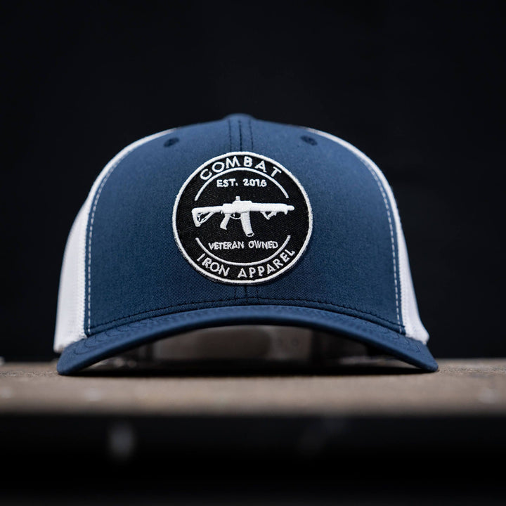 Combat Iron M4 patch, mid-profile snapback hat in navy and white #color_navy-white