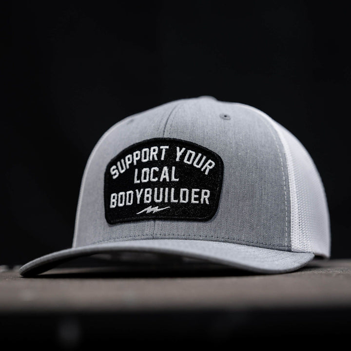 mid-profile mesh snapback with a patch that reads “Support your local bodybuilder #color_gray-white