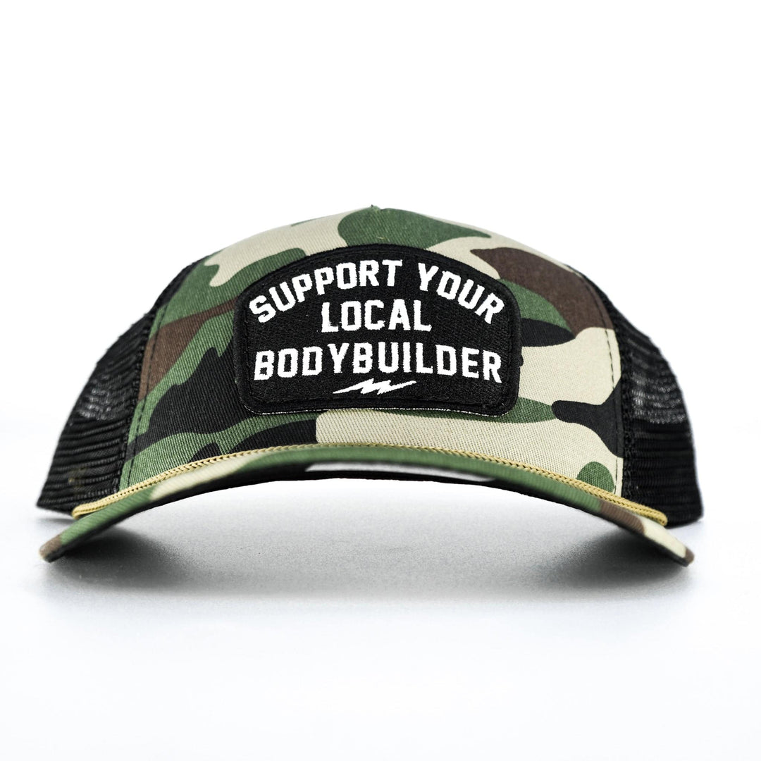 A camo retro rope snapback with a black and white patch saying “Support your local bodybuilder” #color_bdu-camo-black