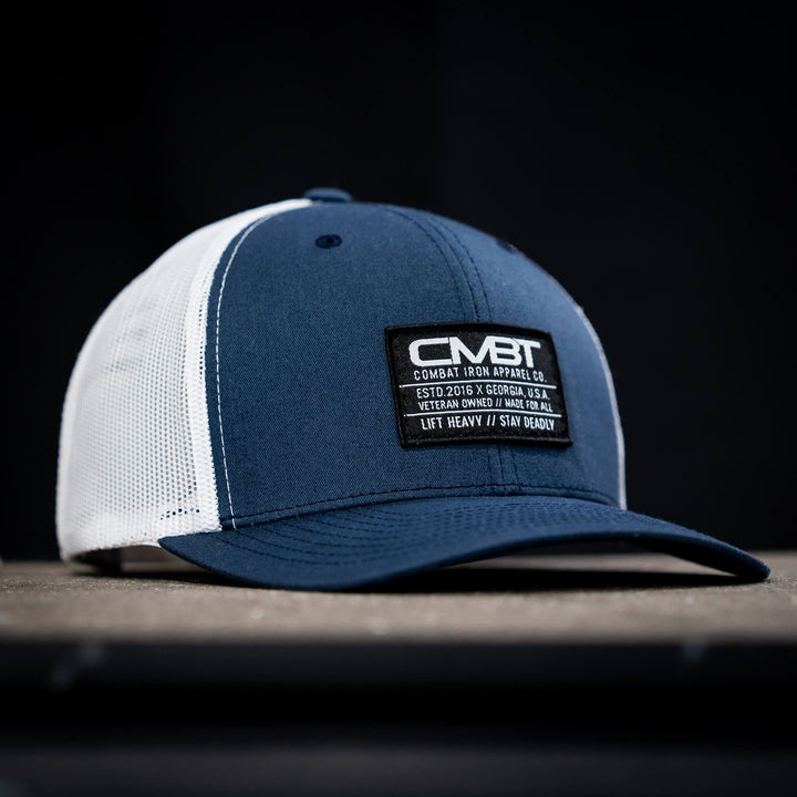 CMBT standard black woven patch mid-profile mesh snapback hat in black with a black and white patch on the front #color_navy-white