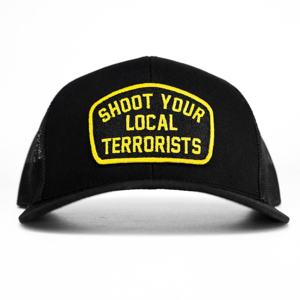 Mid-profile mesh snapback hat in black with a patch that says “Shoot your local terrorists” in yellow #color_black-black