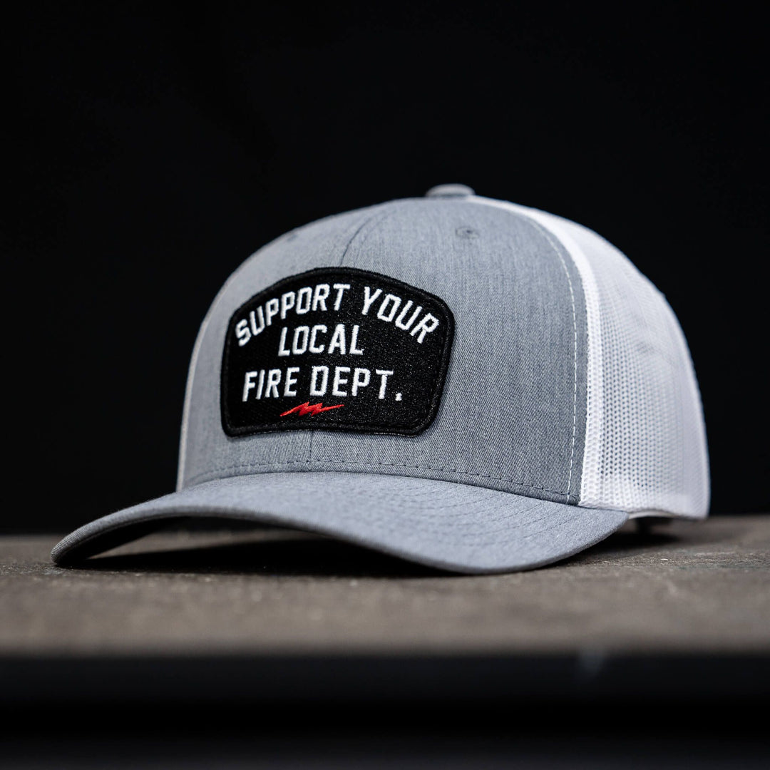 A mid-profile mesh snapback with the patch that says “Support your local fire dept.” 