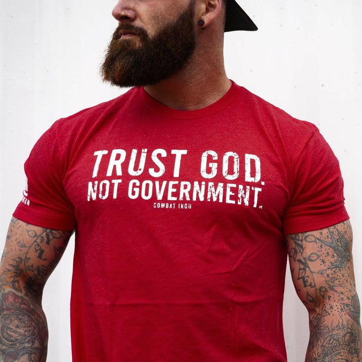 Men’s black t-shirt with the message “Trust God. Not government.” with letters and a American flag on the sleeve #color_red