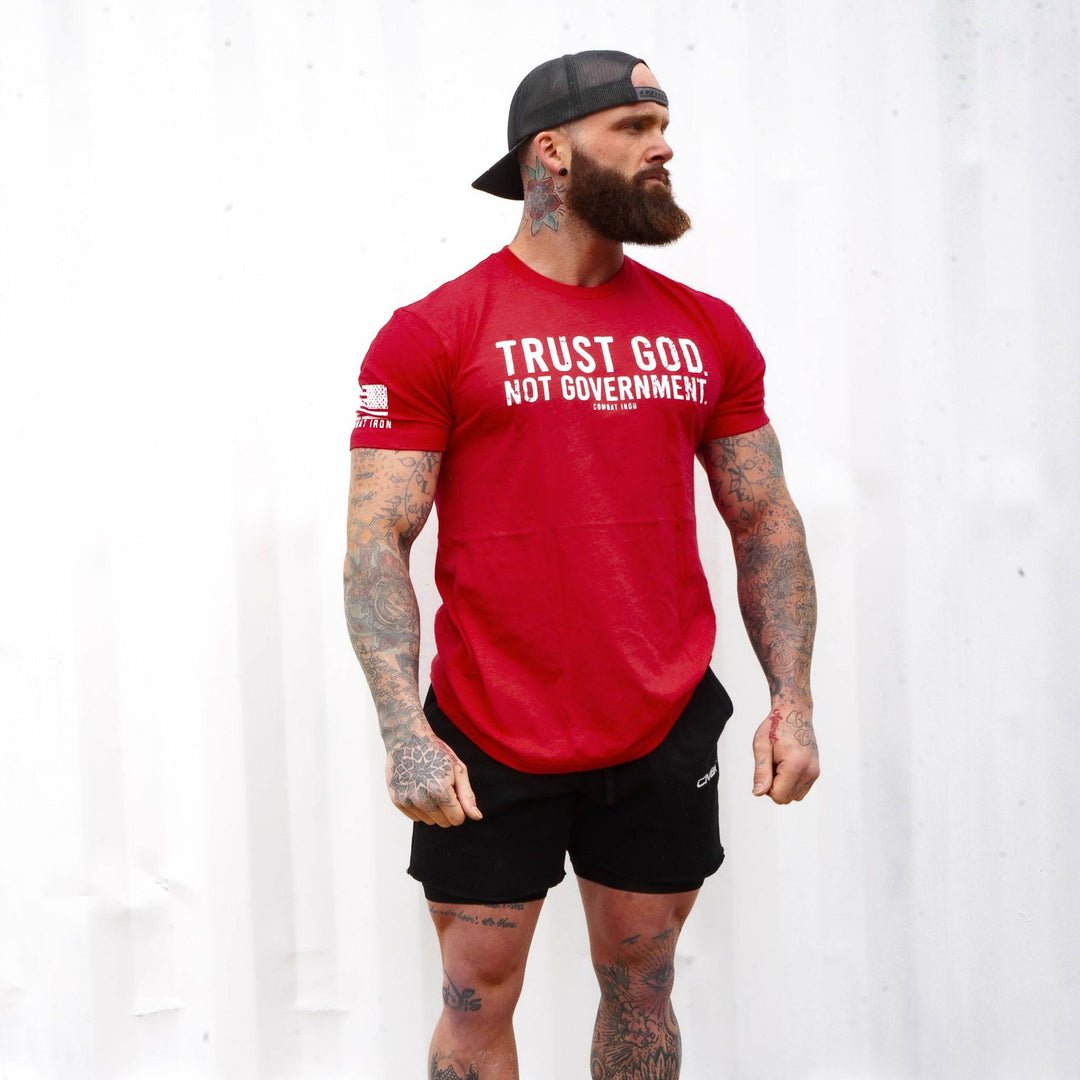 Men’s black t-shirt with the message “Trust God. Not government.” with letters and a American flag on the sleeve #color_red