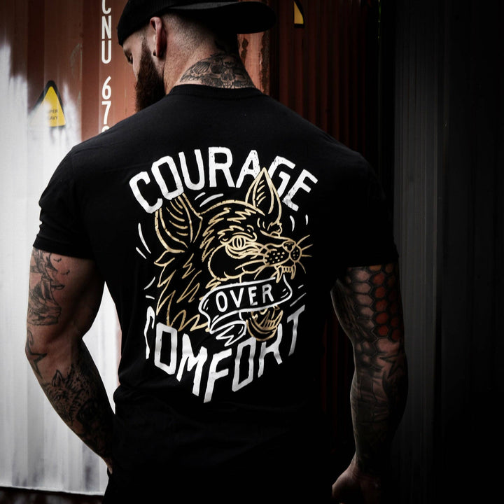 Courage over comfort - wolf edition, men’s t-shirt in black with yellow details #color_black