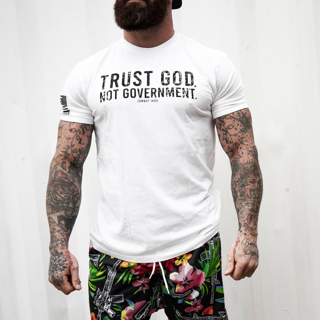 Men’s black t-shirt with the message “Trust God. Not government.” with letters and a American flag on the sleeve #color_white