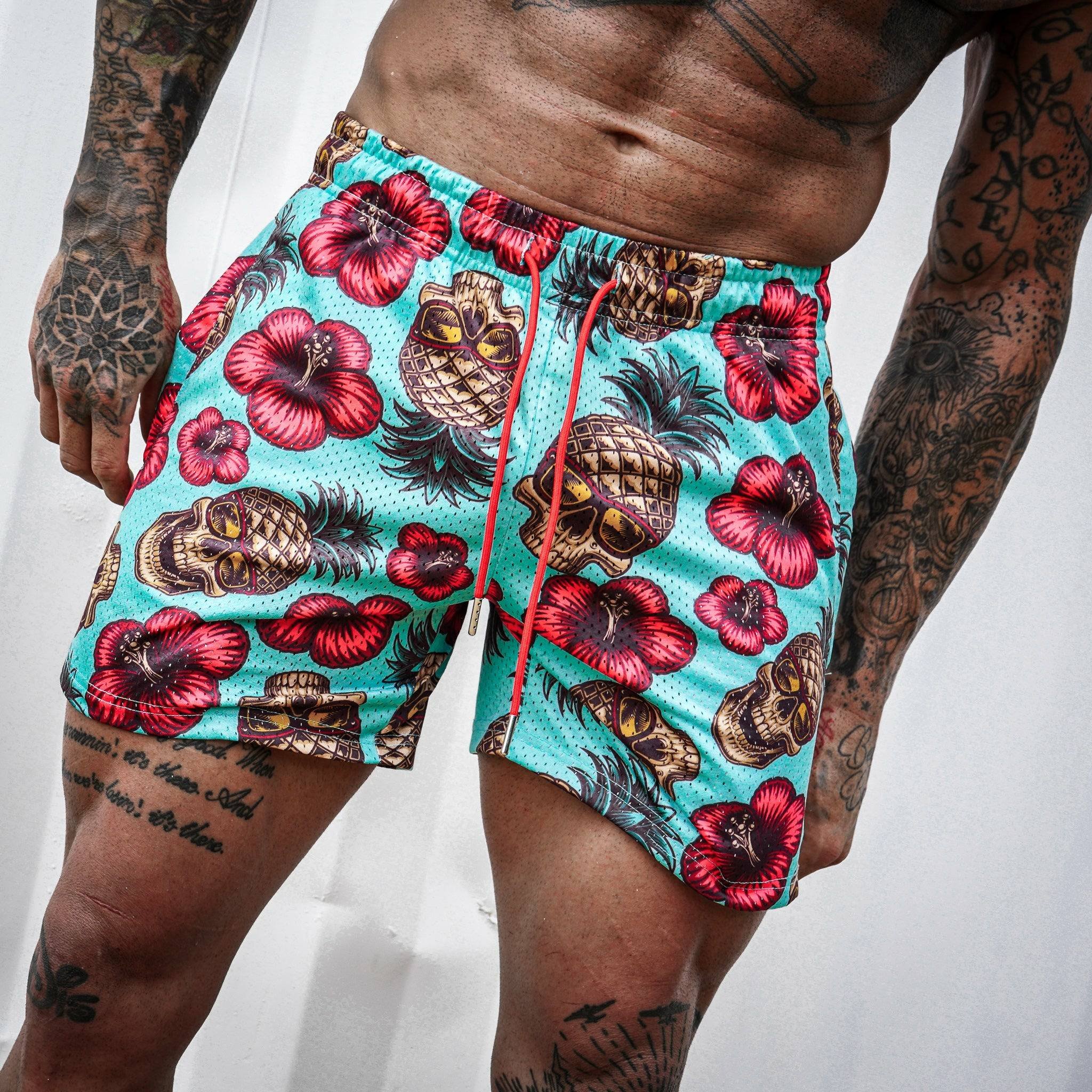 Men’s above the knee lifestyle shorts with mesh in turquoise #color_teal-pineapple-express