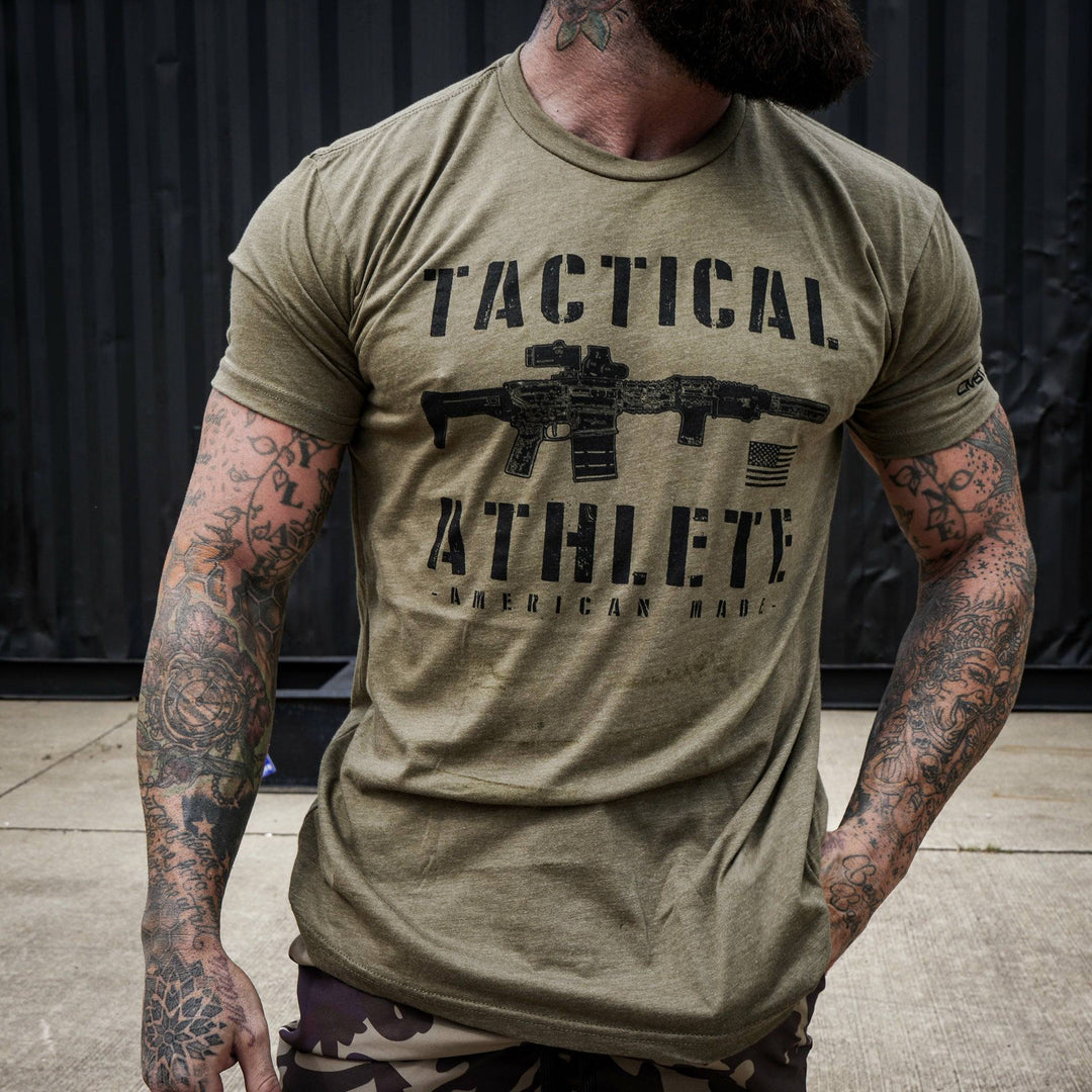 Tactical athlete American-made, men’s t-shirt in olive green with black letters and design #color_military-green 