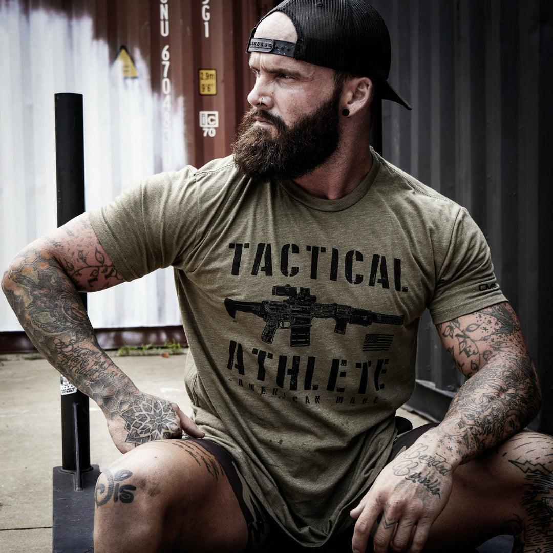 Tactical athlete American-made, men’s t-shirt in olive green with black letters and design #color_military-green 