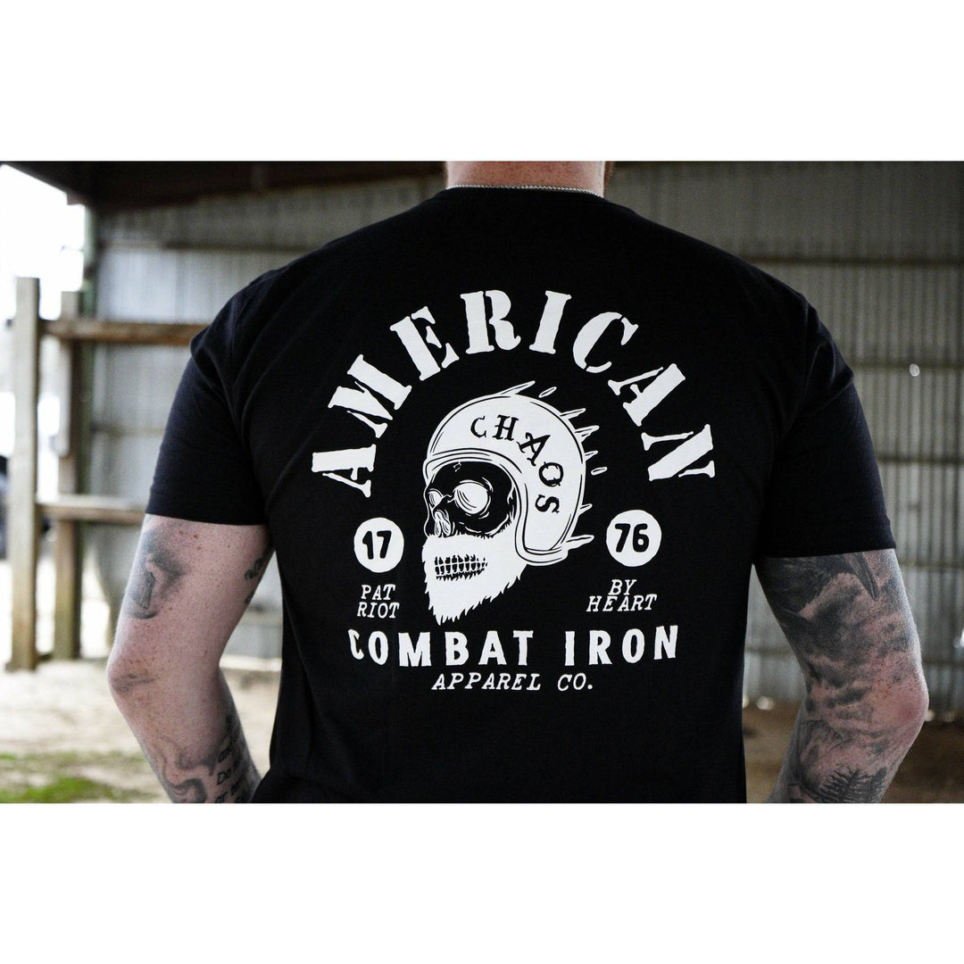 A black men’s t-shirt with the words “American chaos” with a bearded skull in the front and the words “Combat Iron” below the skull #color_black