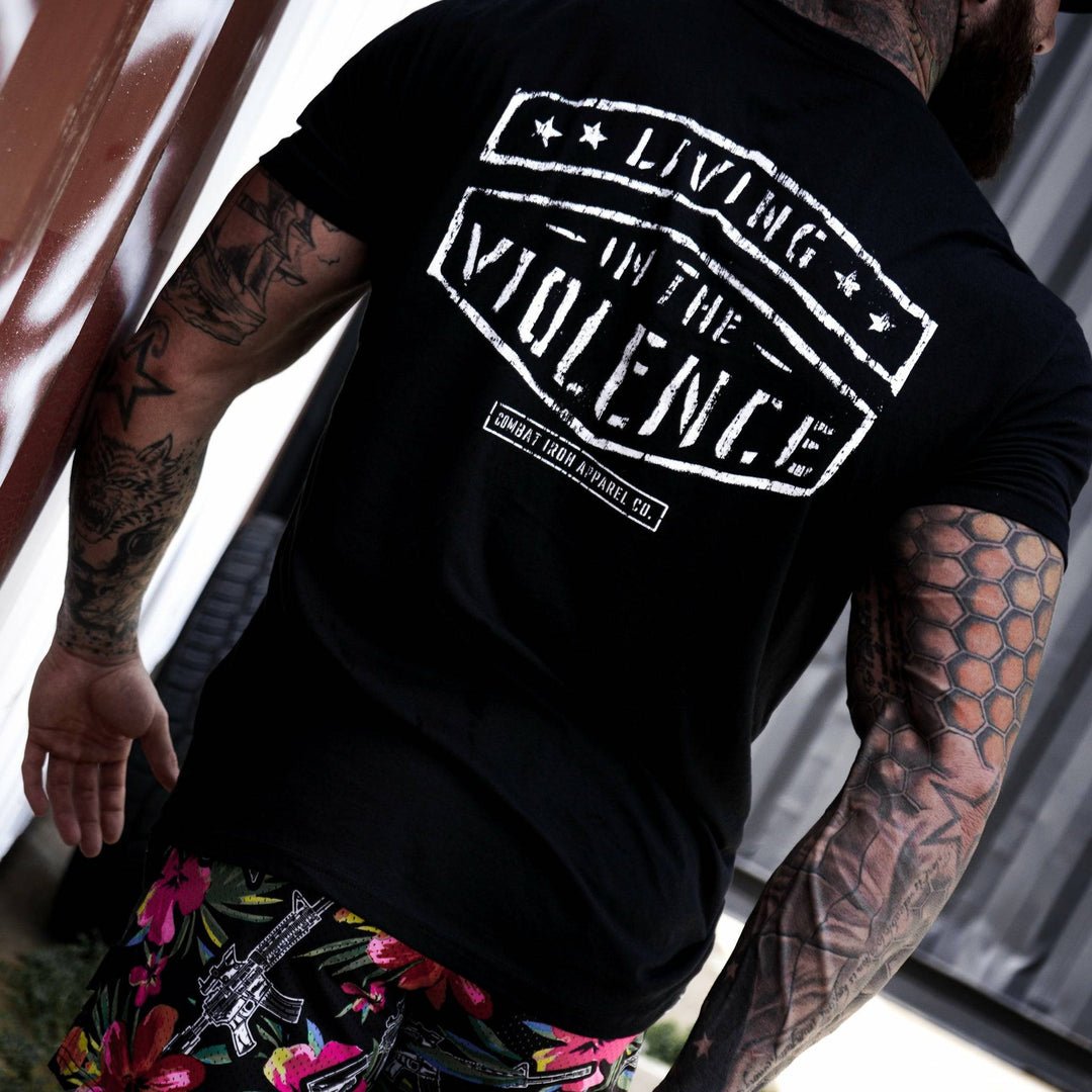 Men’s black t-shirt with the words “Living in the violence” #color_black