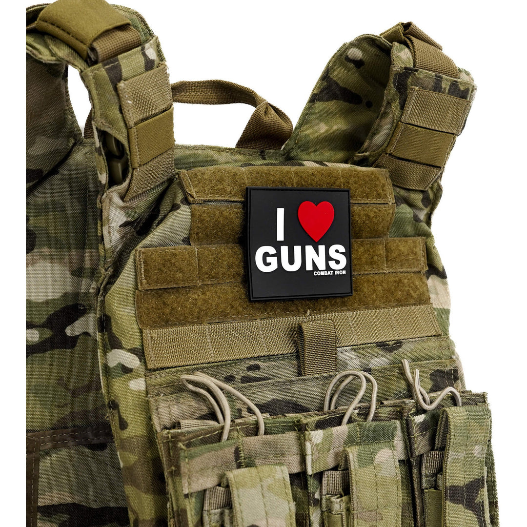I love guns 3D PVC patch with a black background, white letters, and a red heart