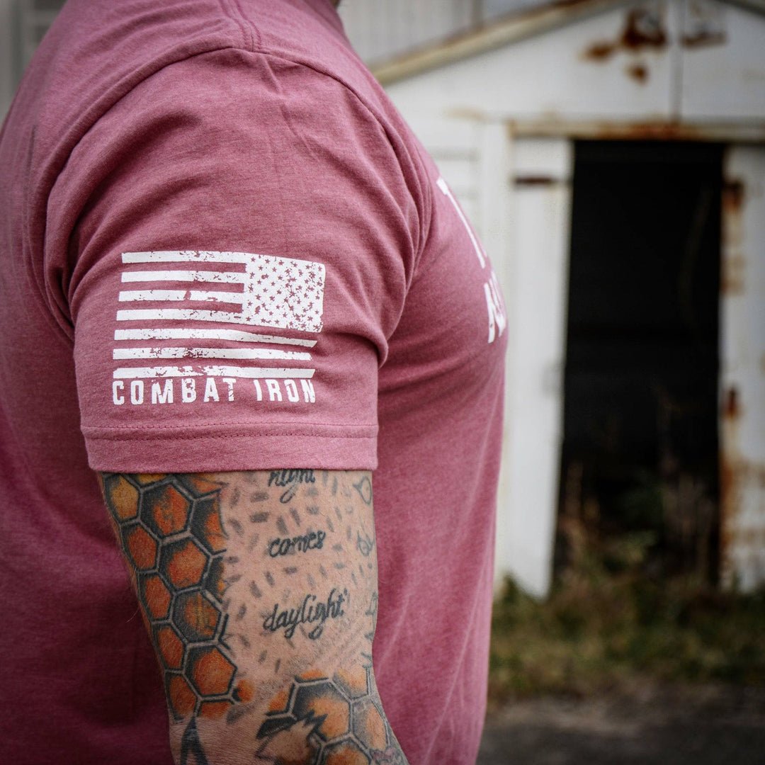 Men’s black t-shirt with the message “Trust God. Not government.” with letters and a American flag on the sleeve #color_muave