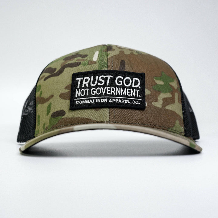 A mid-profile mesh snapback with the words “Trust God. Not government.” in white on the front #color_multicam-black