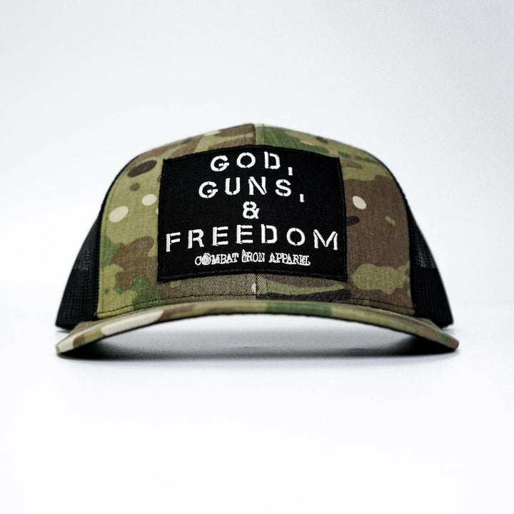 A camo operator ripstop dad hat with a black patch saying “God, guns, and freedom” #color_multicam-black