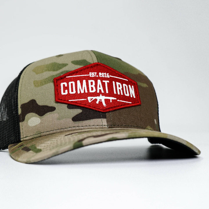 Combat branded patch mid-profile mesh snapback with a black and white patch on the front #color_multicam-black