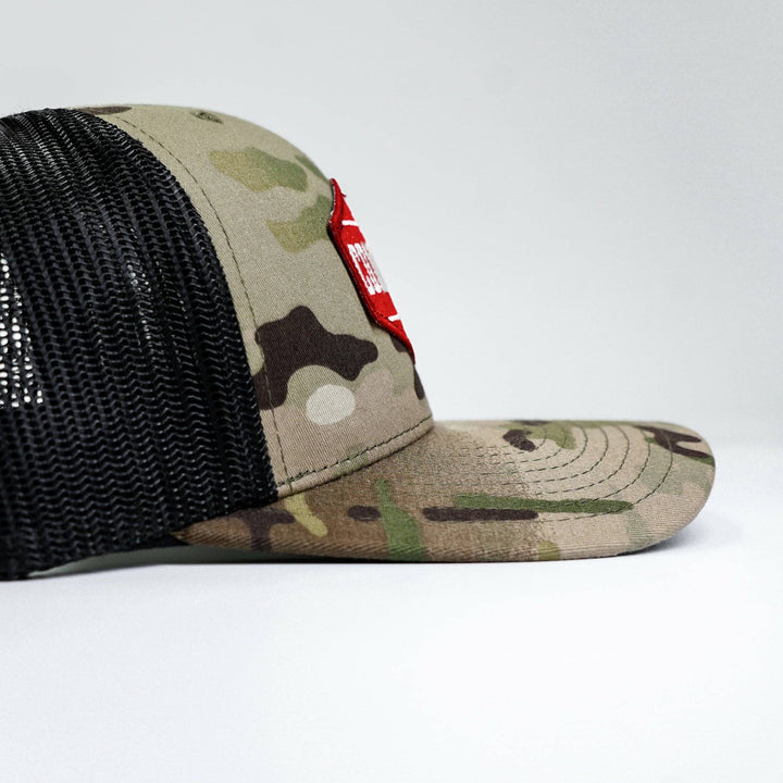 Combat branded patch mid-profile mesh snapback with a black and white patch on the front #color_multicam-black