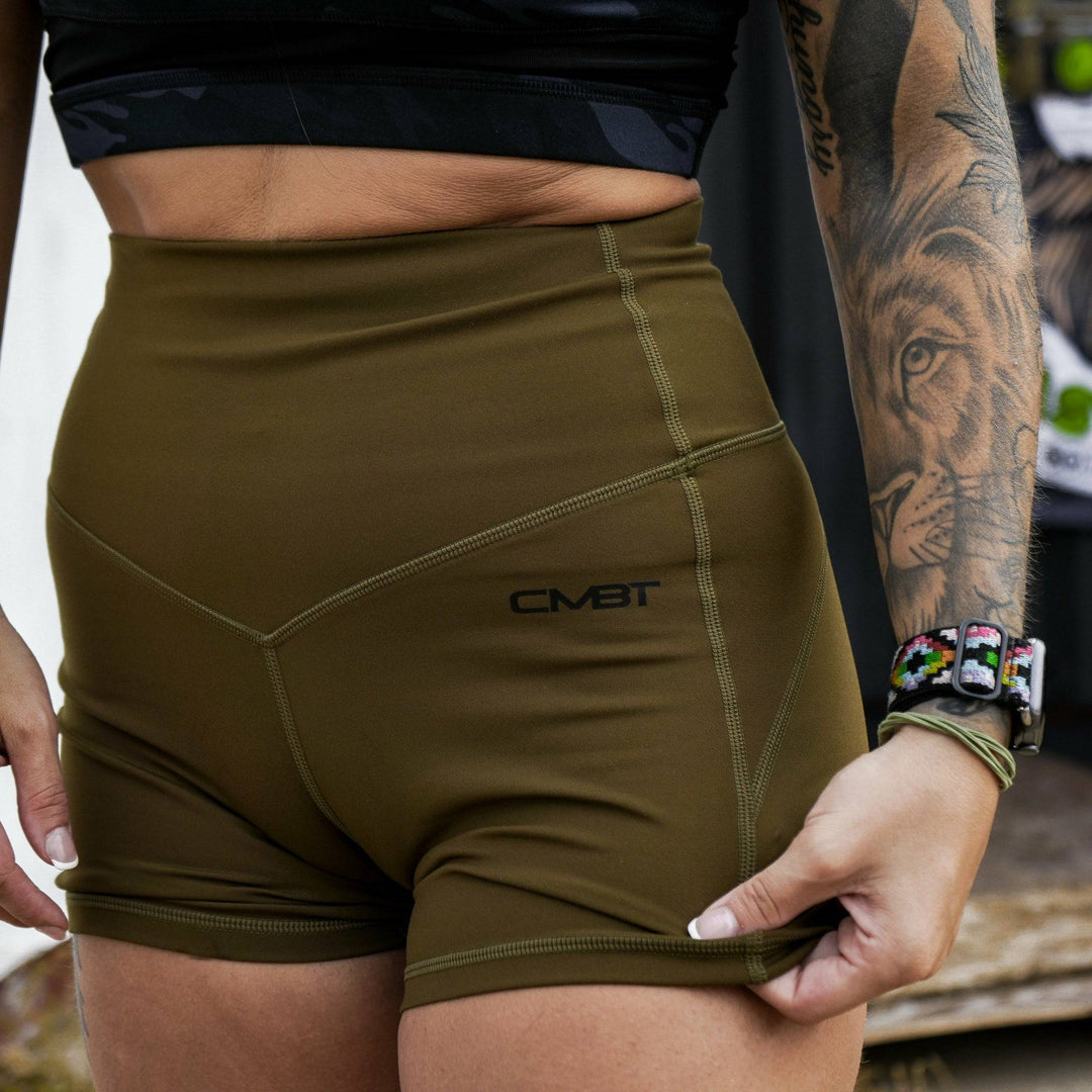 Ladies' luxe high-waisted shorts for women, all military green with the CMBT logo #color_military-green