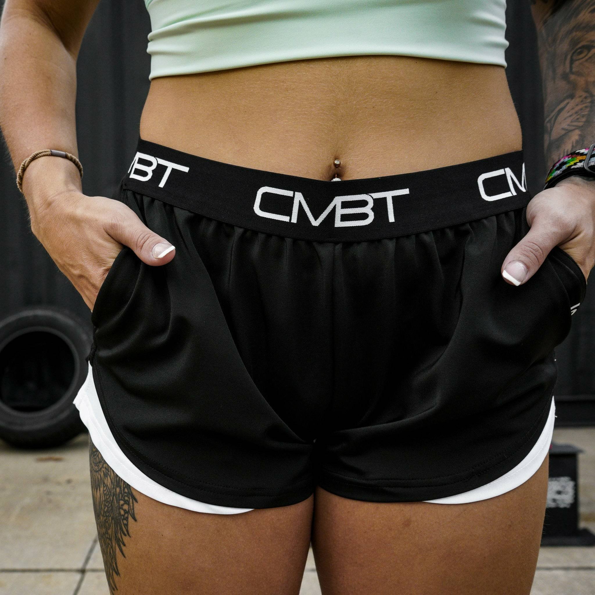 CMBT cross-training ladies’ shorts, all black with the CMBT logo in white #color_black