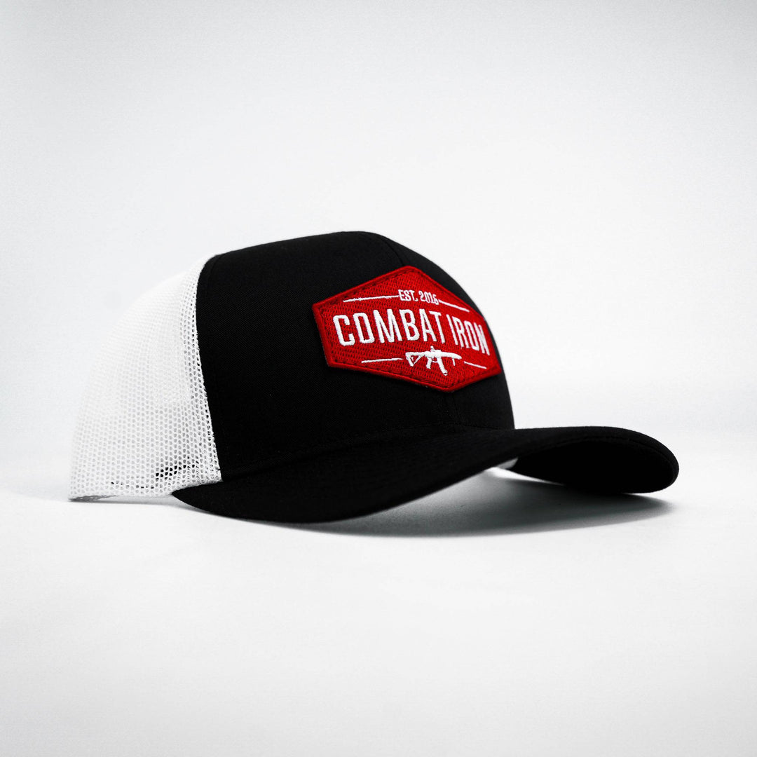 Combat branded patch mid-profile mesh snapback with a black and white patch on the front #color_black-white