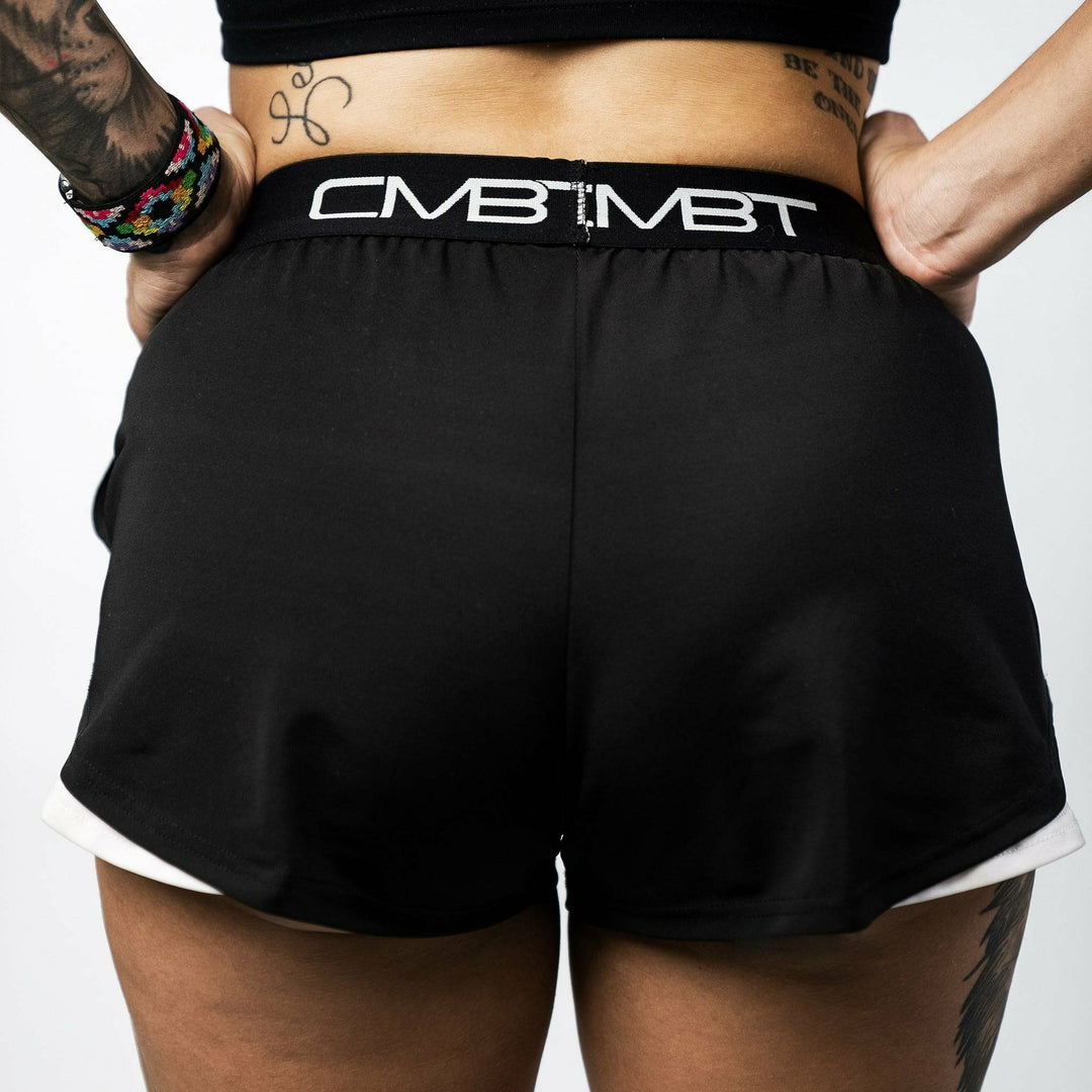 CMBT cross-training ladies’ shorts, all black with the CMBT logo in white #color_black