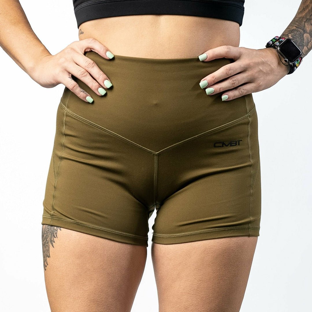 Ladies' luxe high-waisted shorts for women, all military green with the CMBT logo #color_military-green