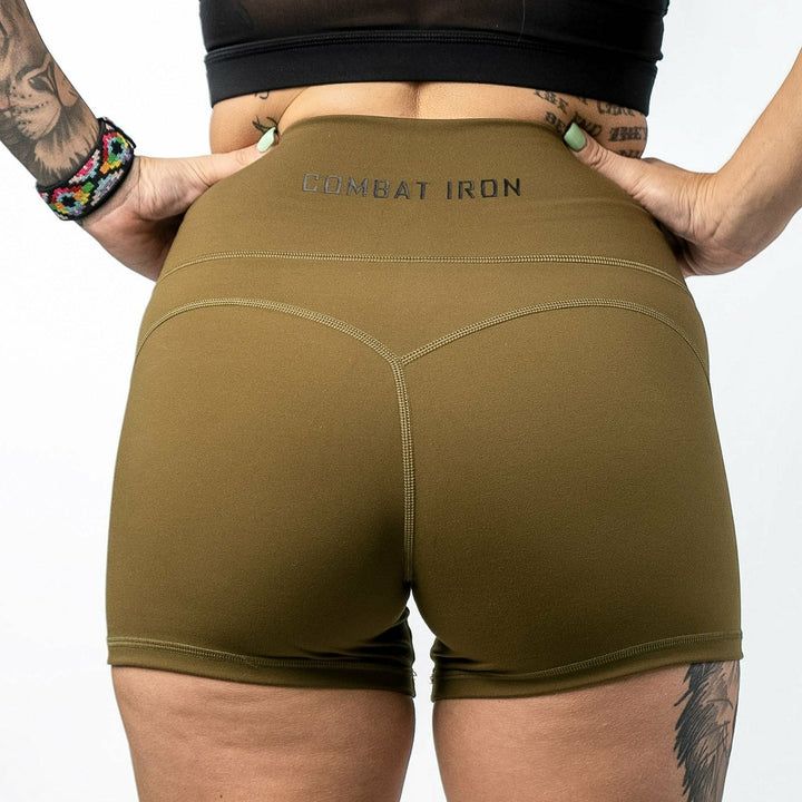 Ladies' luxe high-waisted shorts for women, all military green with the CMBT logo #color_military-green
