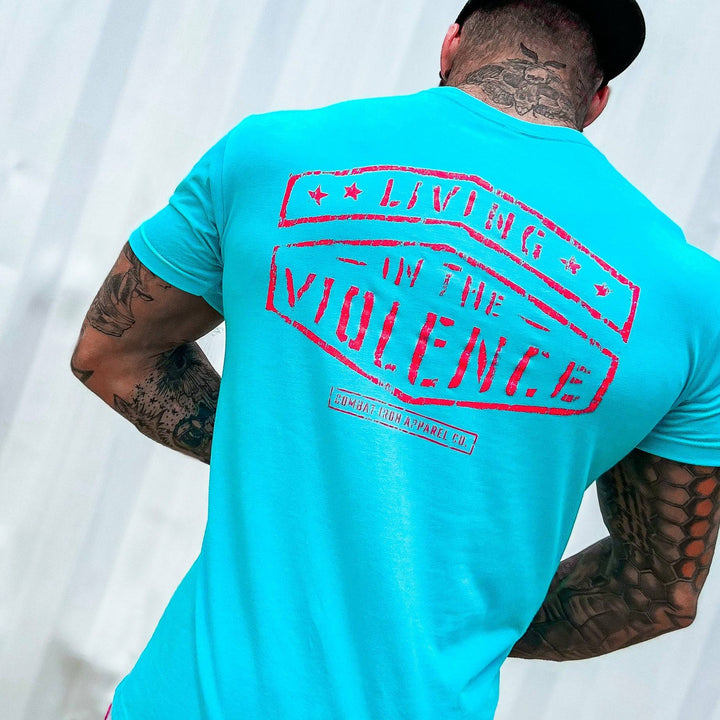 Men’s t-shirt with the words “Living in the violence” #color_tahiti-blue