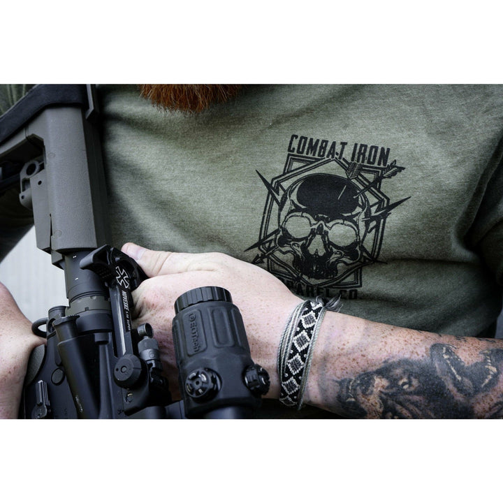 Men’s t-shirt showing words “Choose violence” in black and a white skull in the middle #color_military-green